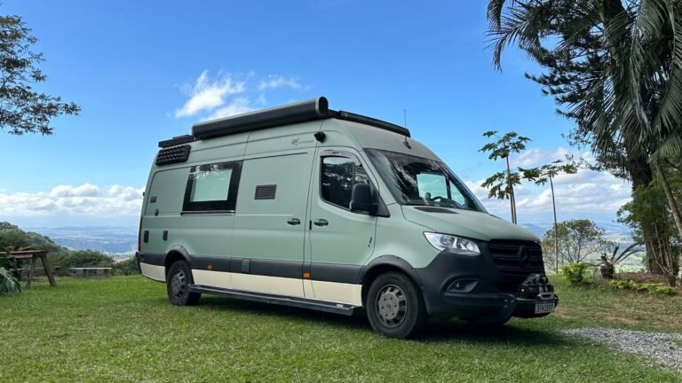a camper van UP! Motorhome parked on grass
